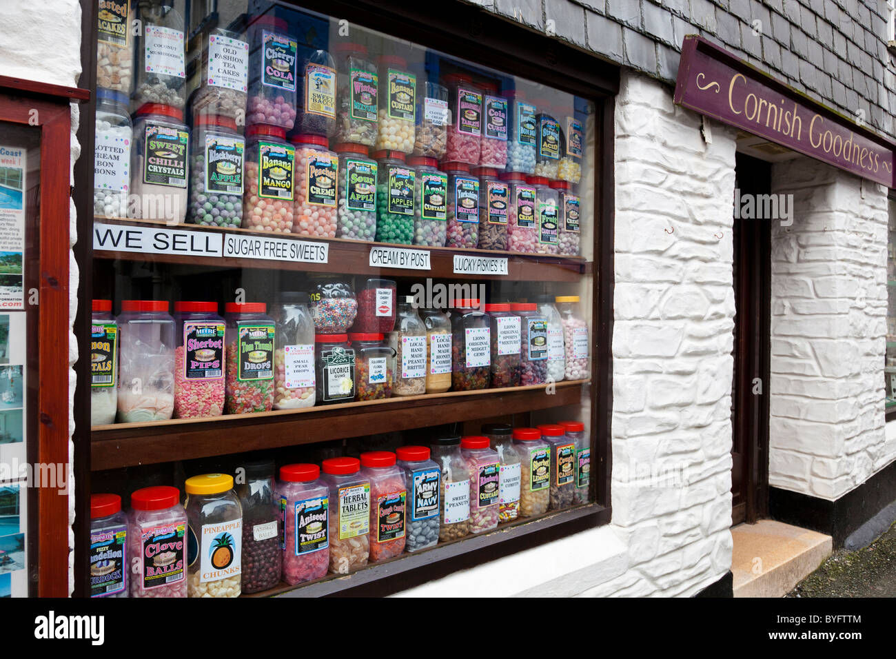 Old fashioned sweet shop with a window display of sweet jars in