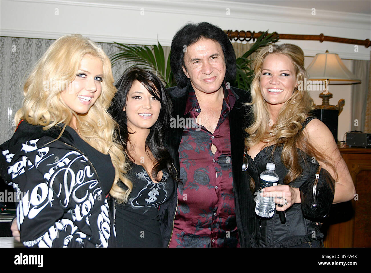 Gene Simmons and Vancouver models Gene Simmons celebrates the launch of