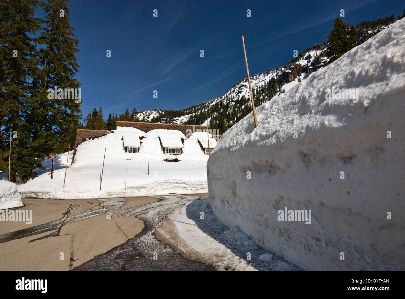 Walls of snow in winter around Steel Park Headquarters at Crater Lake National Park, Oregon, USA