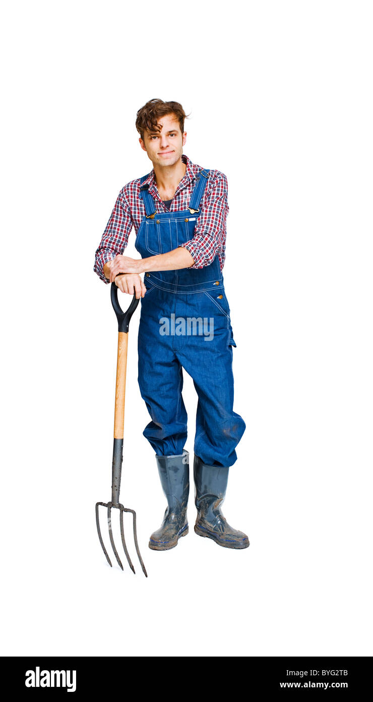 Studio shot of farmer with pitchfork Stock Photo