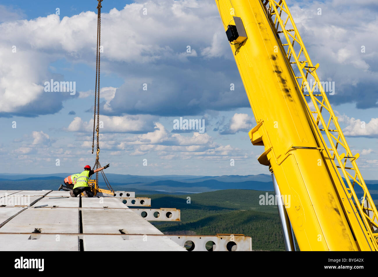Workers at construction site Stock Photo - Alamy