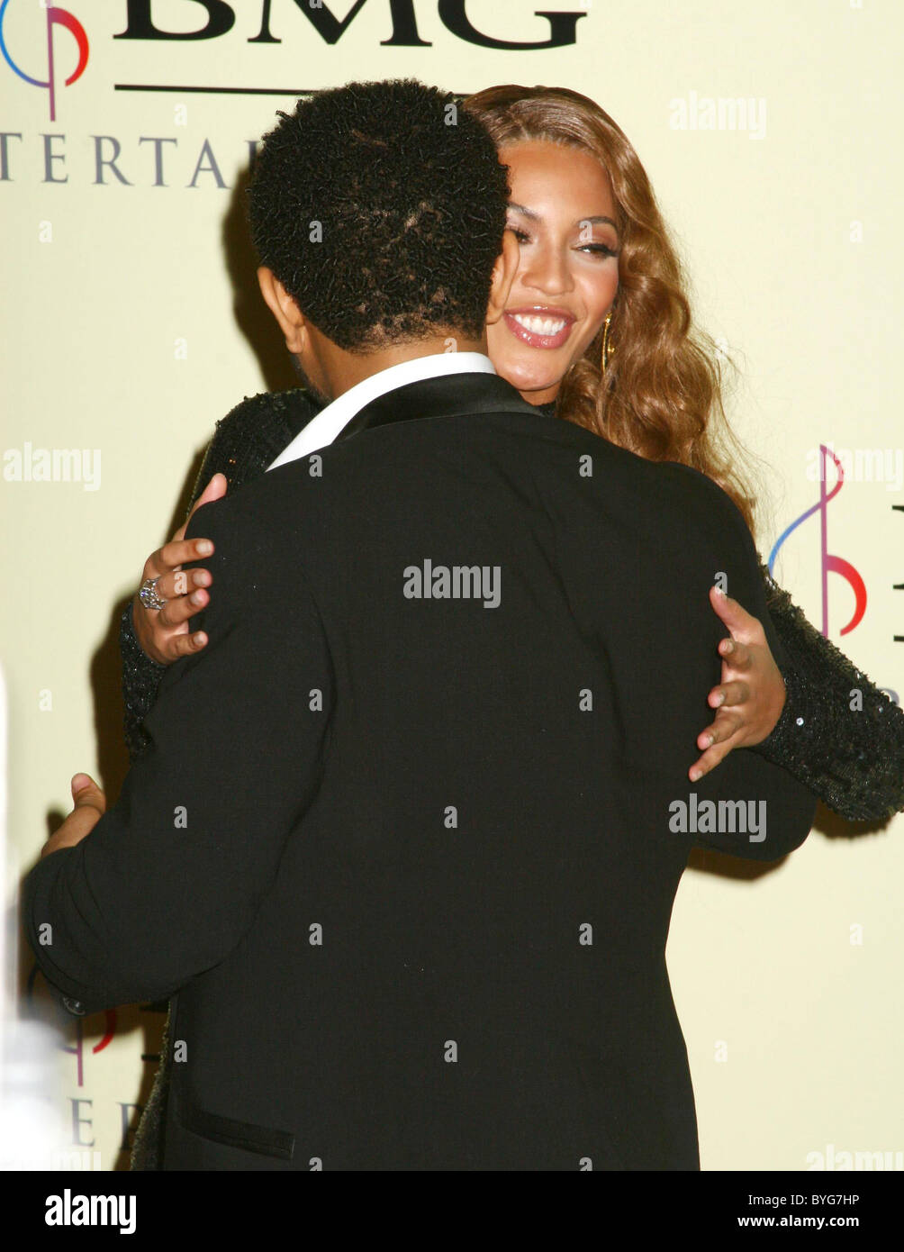 John Legend hugs Beyonce Sony and BMG Post Grammy party, held at the ...