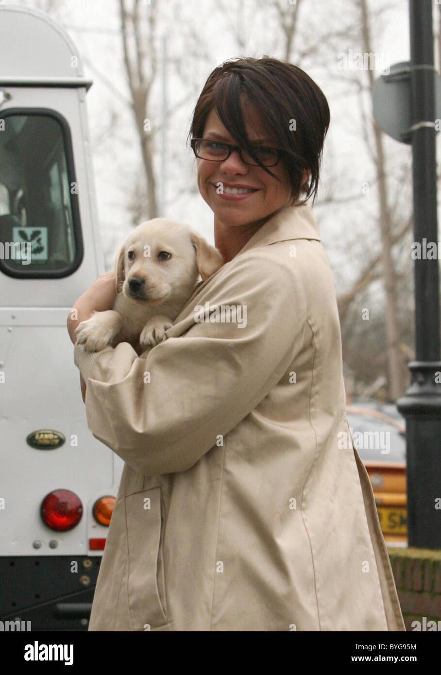 Jade Goody with the new family pet. Jade's son Bobby Jack is trying to decided on a name for the puppy but cannot choose Stock Photo