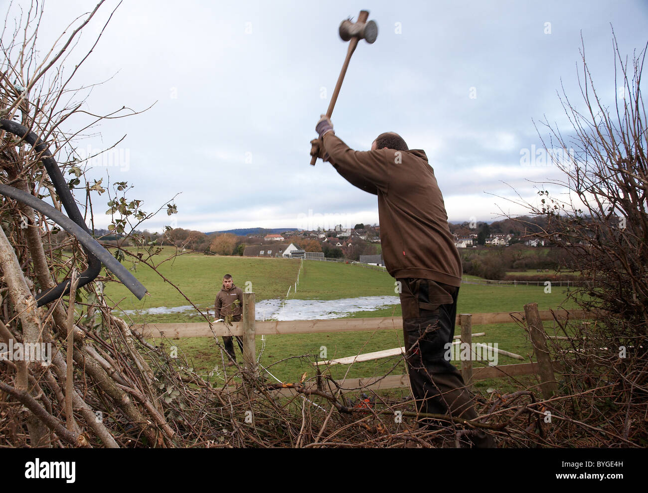 Repairing wooden fence post hires stock photography and images Alamy