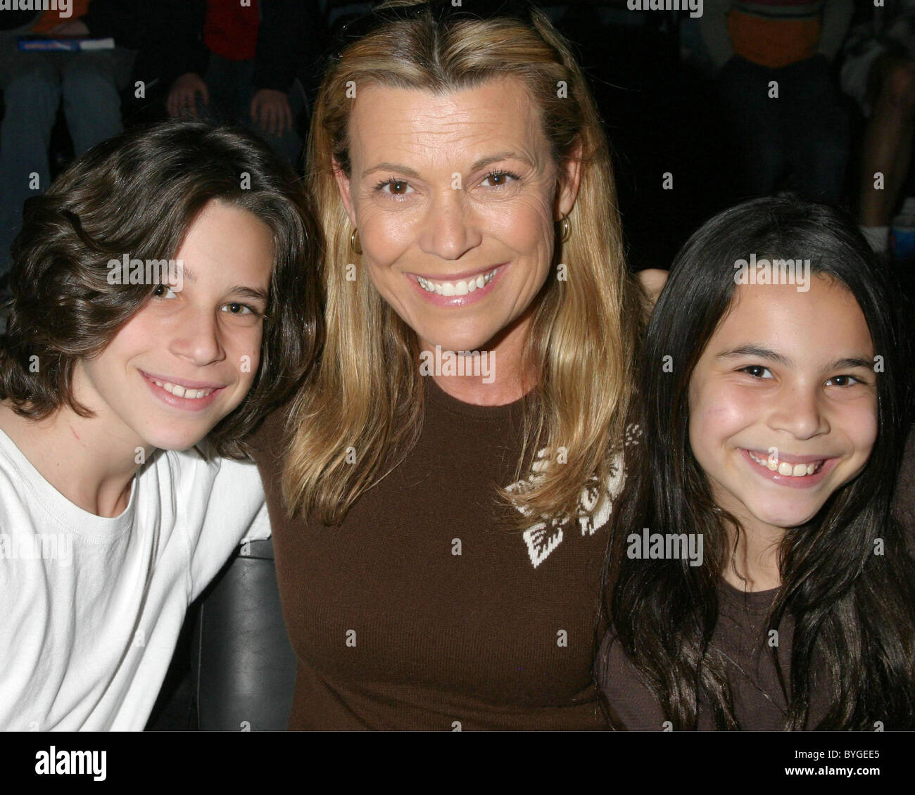 Vanna White with her children at a Harlem Globetrotters game
