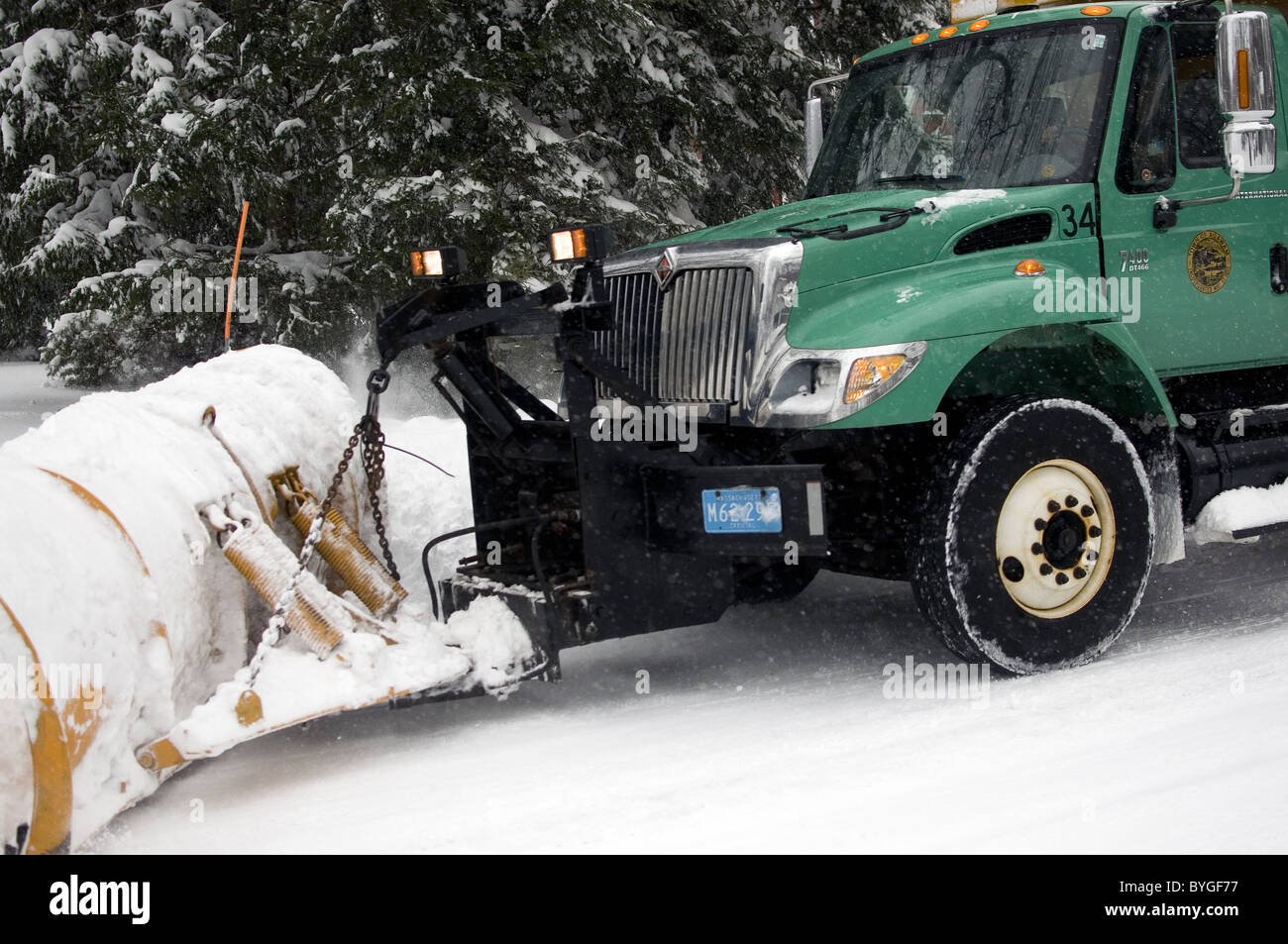 Truck plowing snow Stock Photo Alamy
