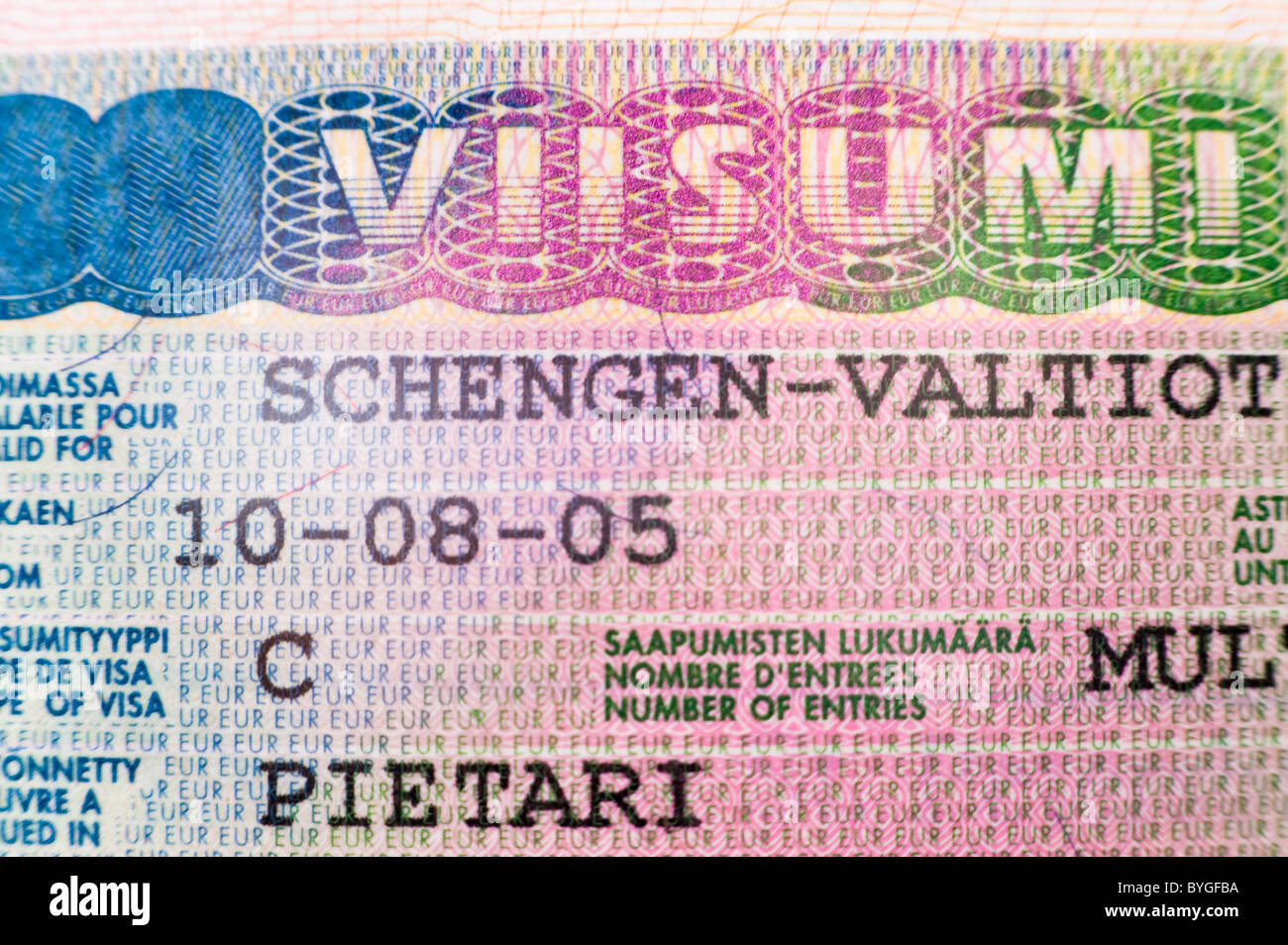 a entry Shengen visa stamp into Finland in a passport Stock Photo - Alamy