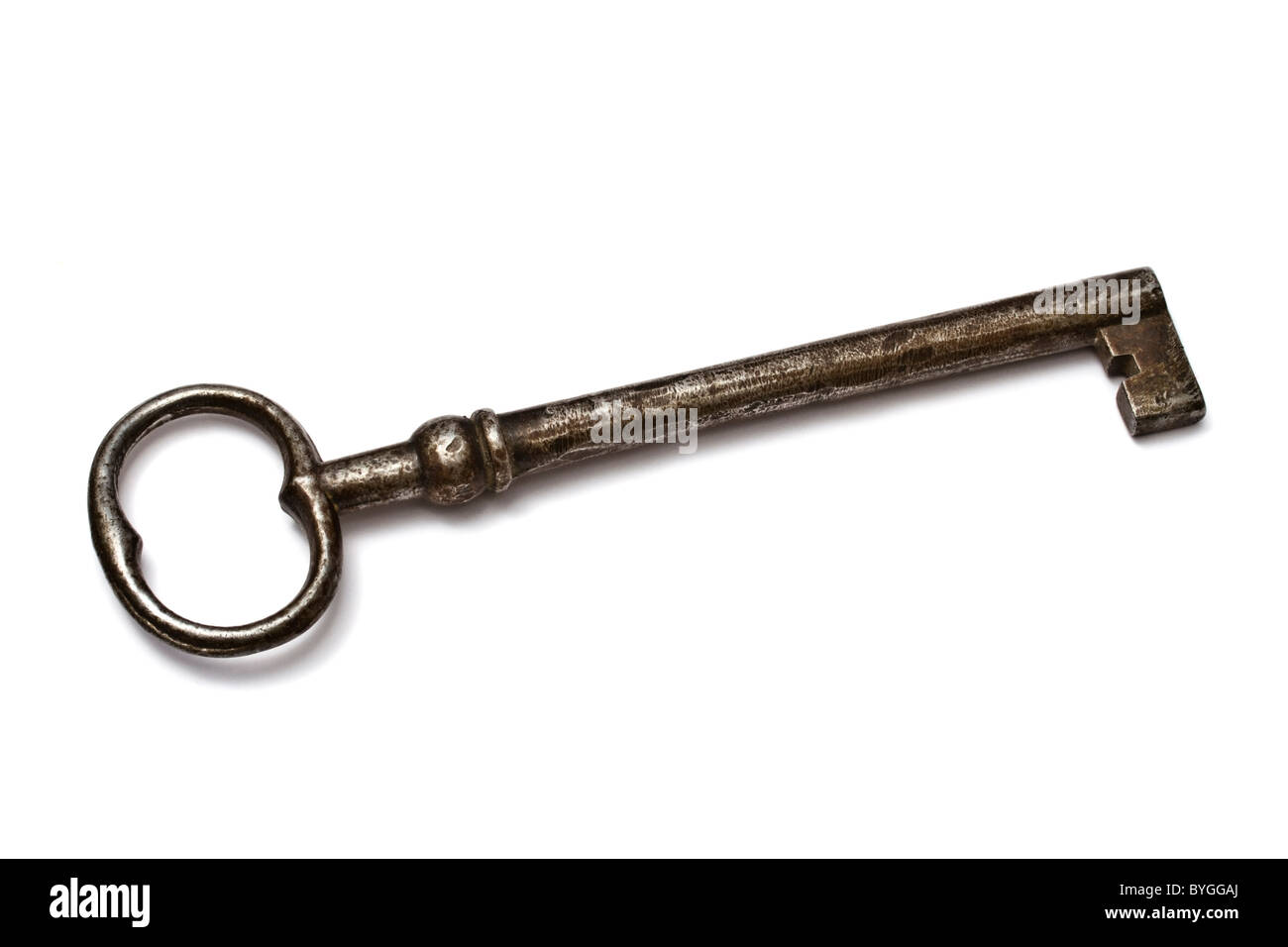 Old key isolated on white background Stock Photo - Alamy