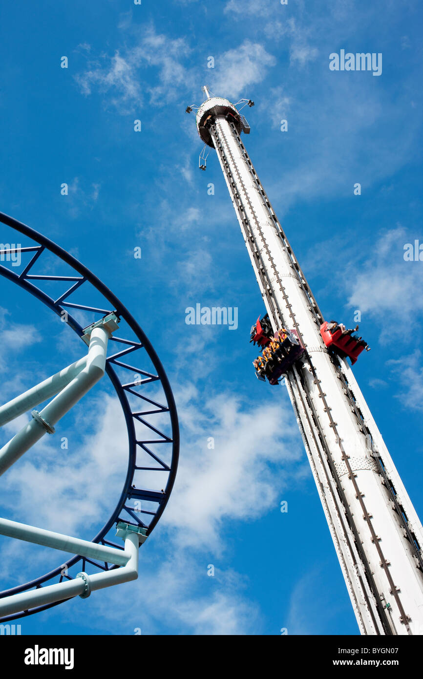 Amusement park ride against blue sky Stock Photo