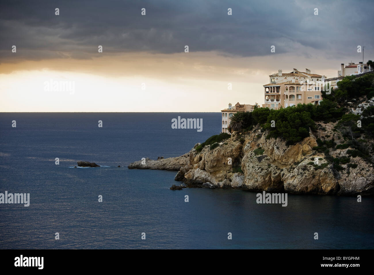 Houses on island by sea Stock Photo Alamy