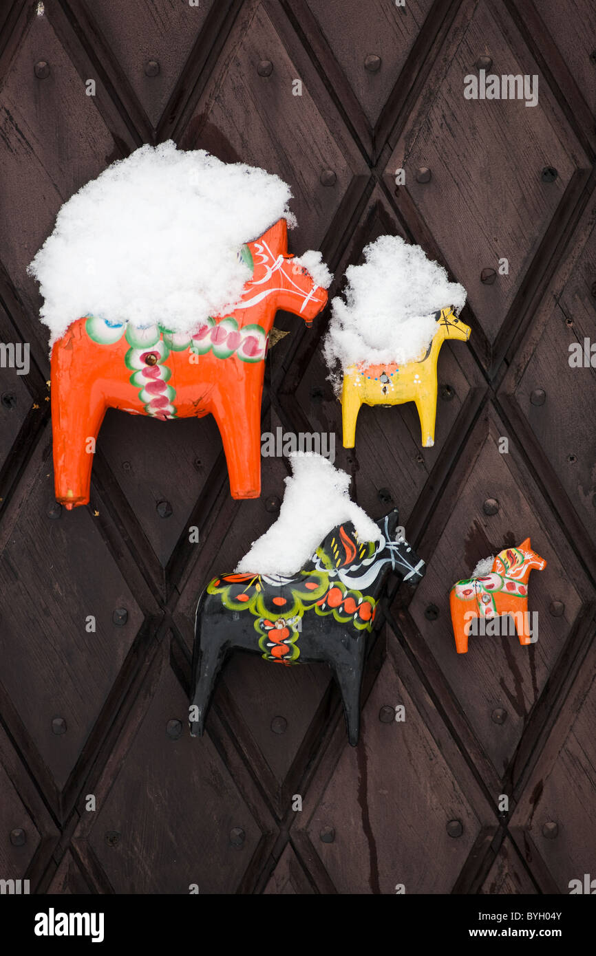 Dalecarlian horses with snow Stock Photo