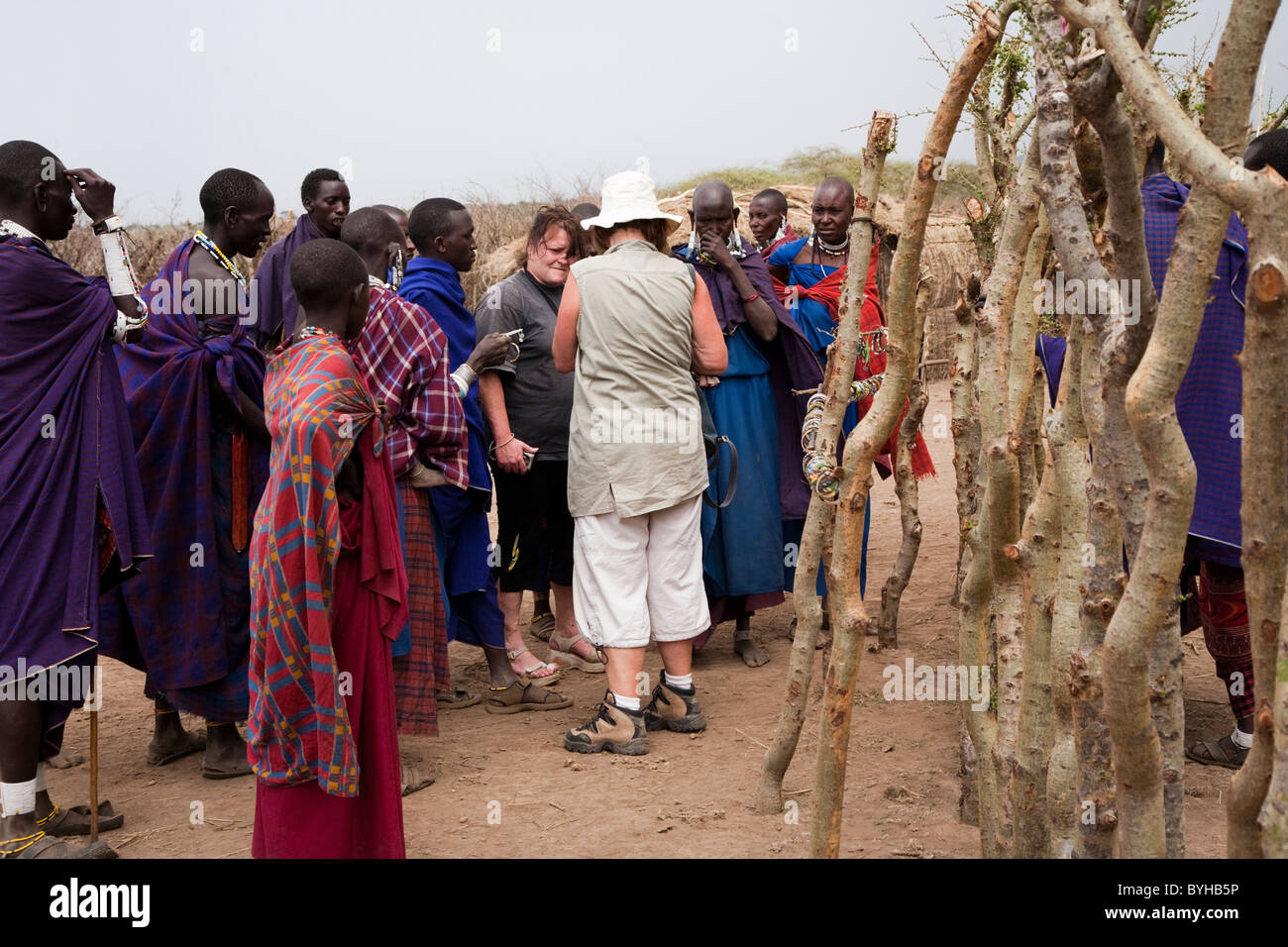 Tourists visiting Masai village, northern Tanzania, Africa Stock Photo