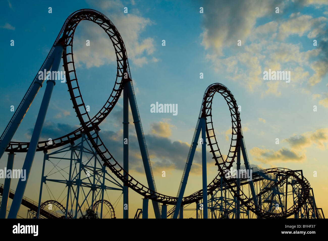 Roller Coaster at Sunset Stock Photo - Alamy