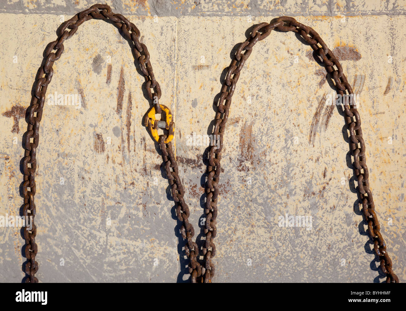 U shaped loops of rusty iron chain Stock Photo