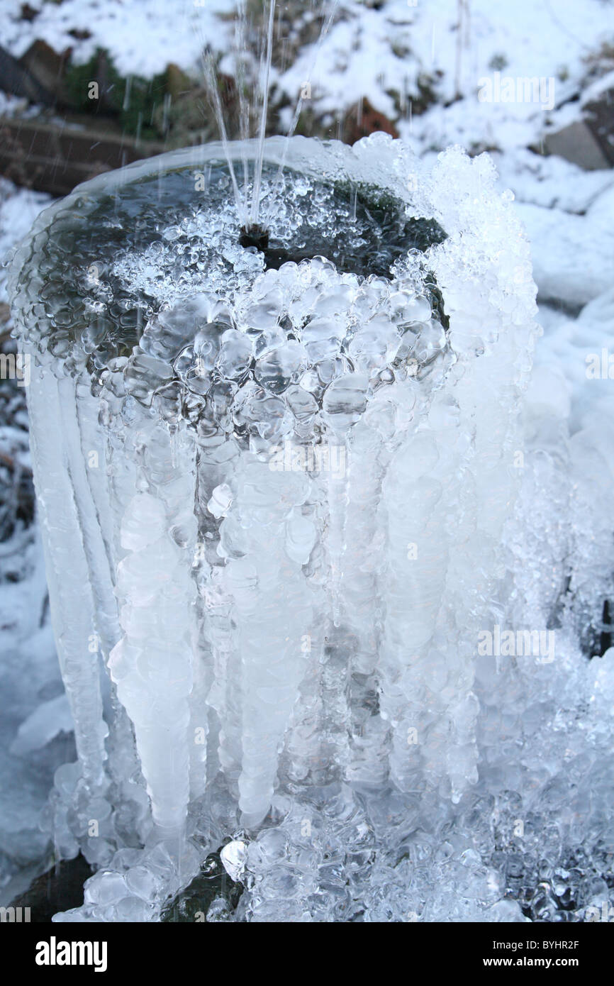 Frozen fountain in winter Stock Photo