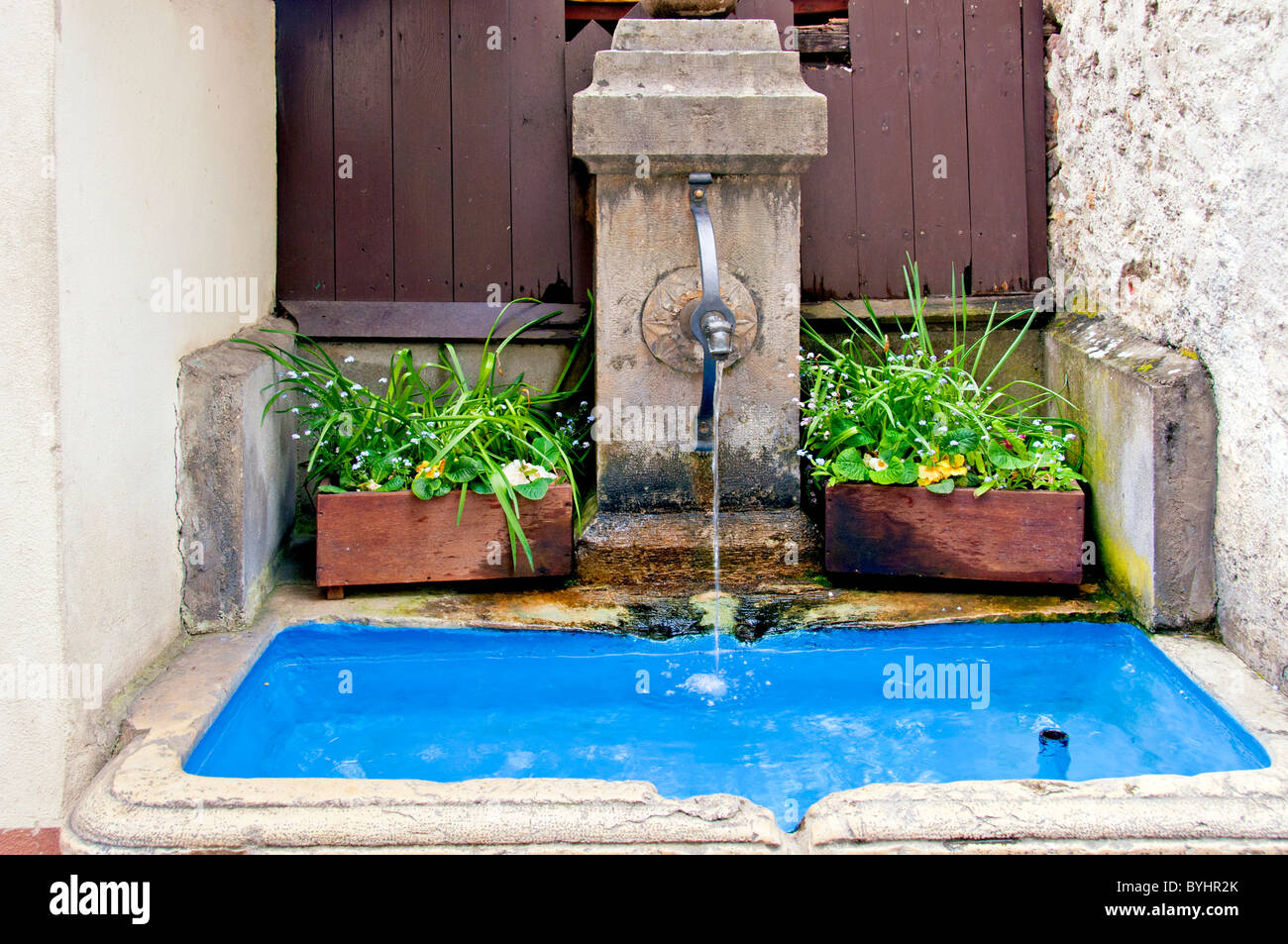 old fountain in a small town in Southern Germany, Brunnen in Staufen Stock Photo