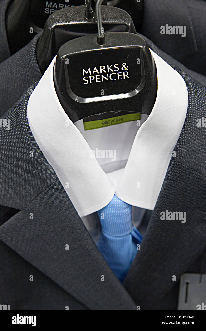 Marks & Spencer shirt tie and jacket on hanger in outlet shop Wales UK Stock Photo