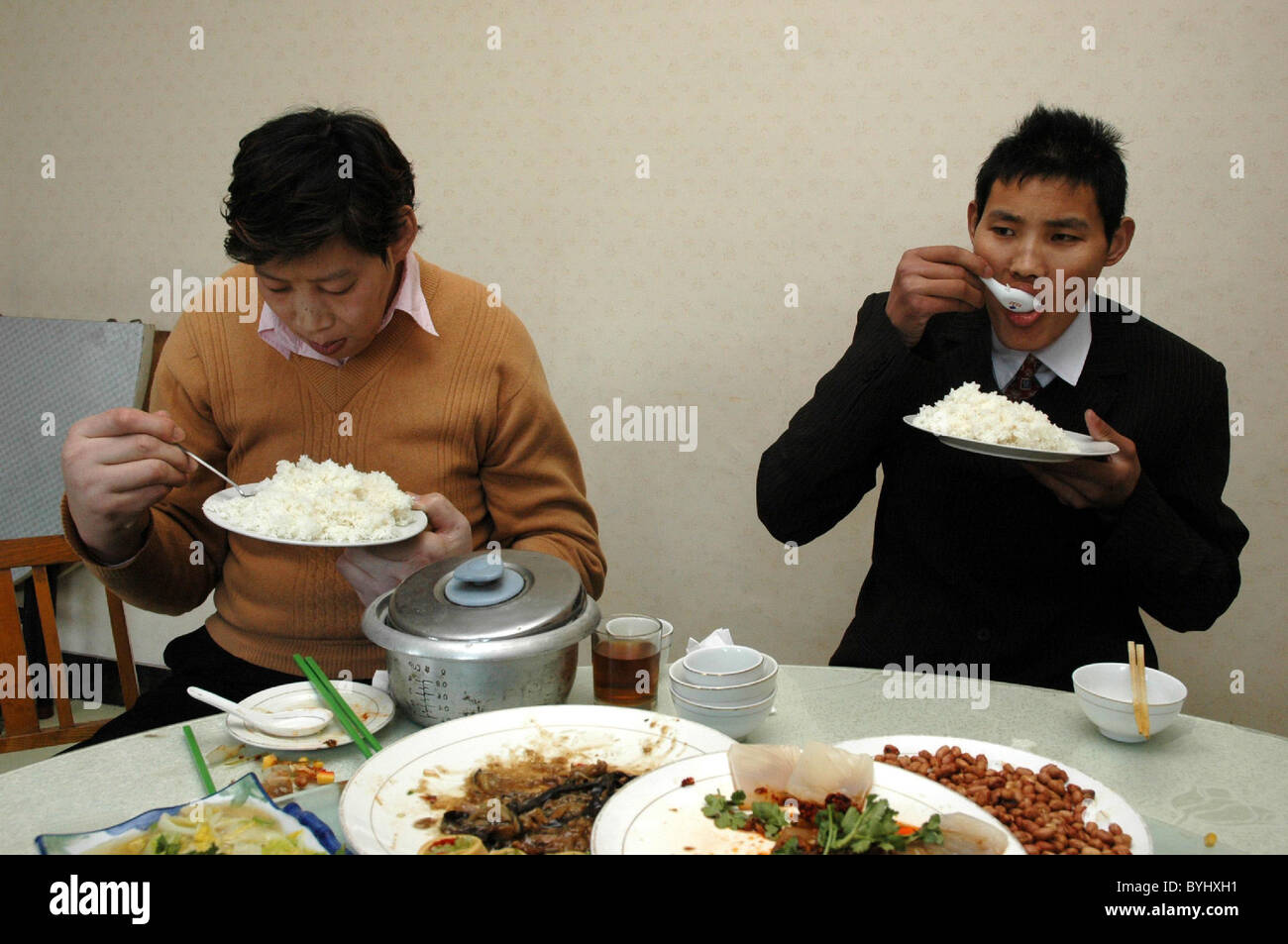 THE EIGHT FOOT TALL MAN These two pals from Jilin, China have a very