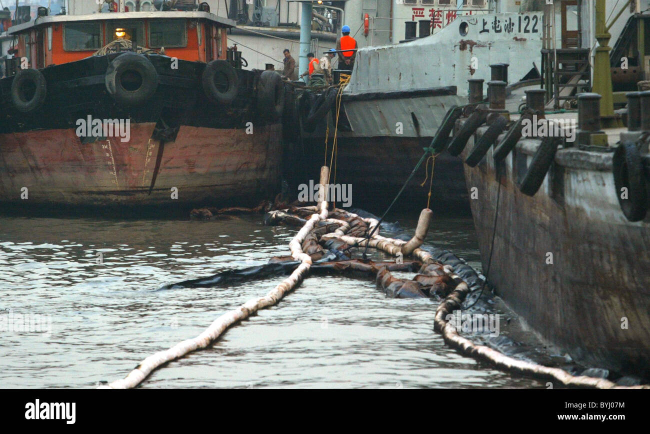 OIL LEAK HITS CHINA'S HUANGPU RIVER A massive oil leak in the Huangpu River in China halted sea