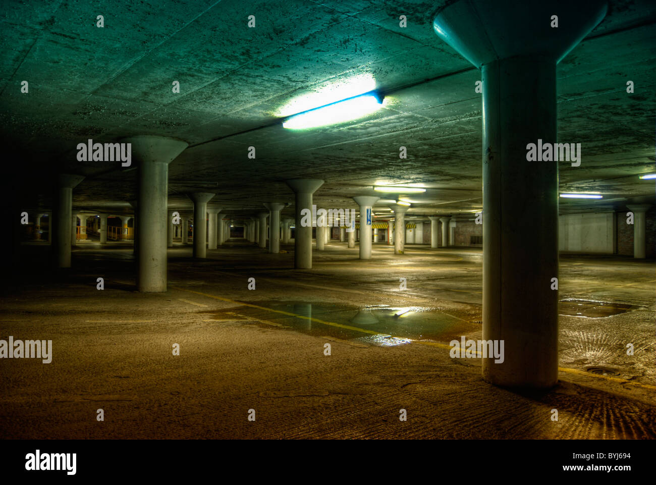 Creepy underground car park. Stock Photo