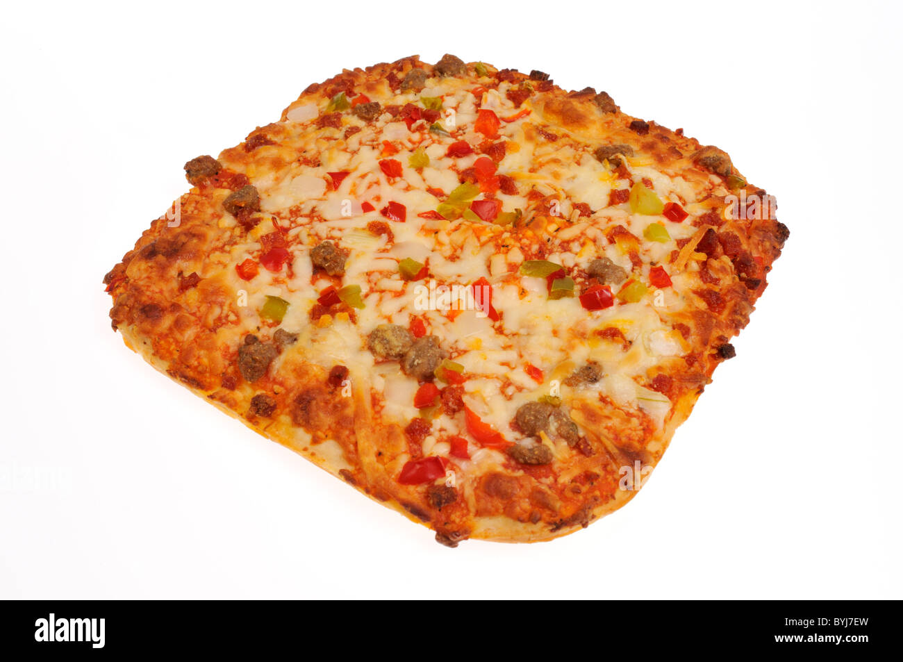 Cooked whole square pizza with red & green peppers and meat on white background, cutout. Stock Photo