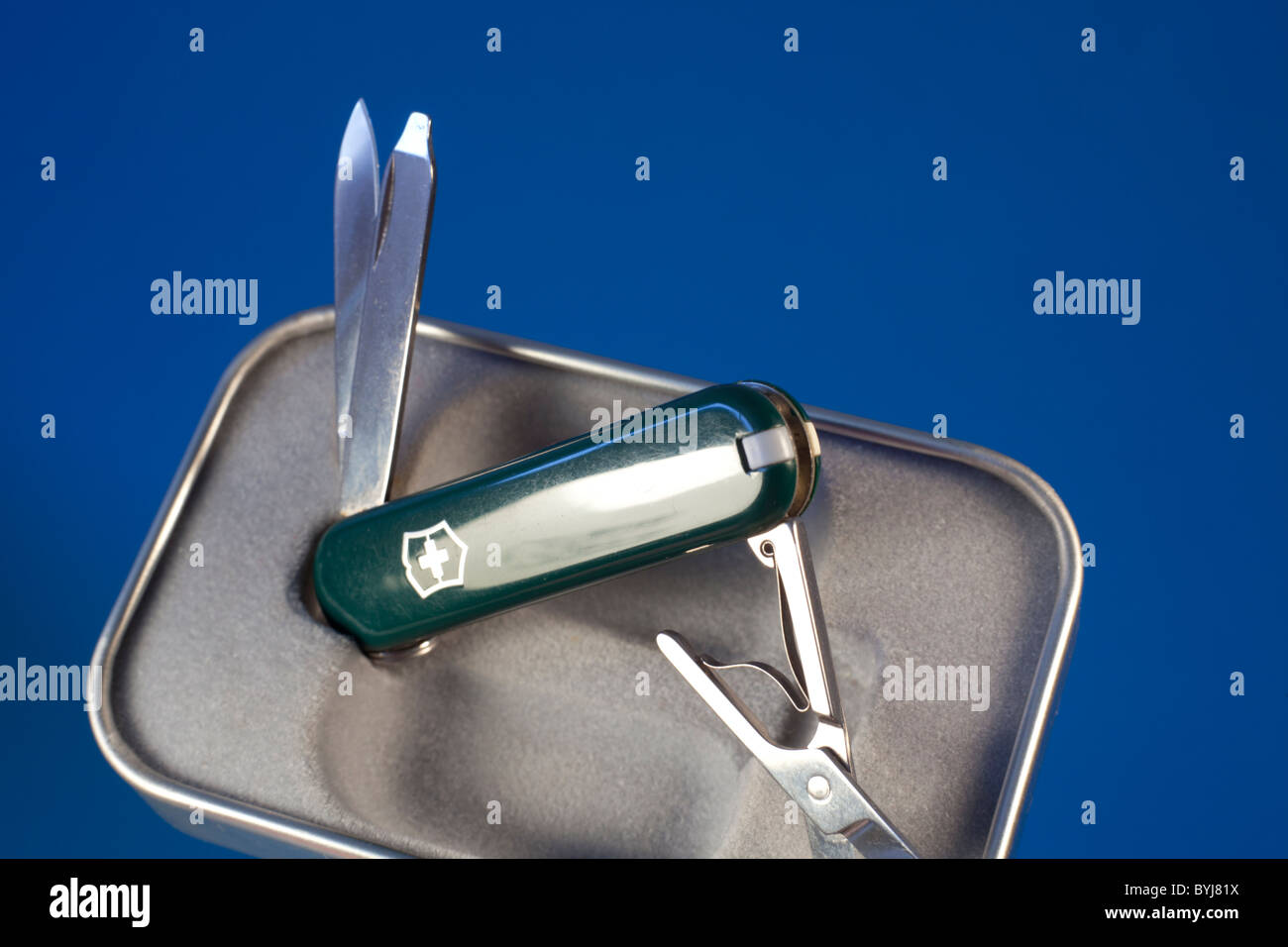 A executive swiss army knife in green Stock Photo Alamy