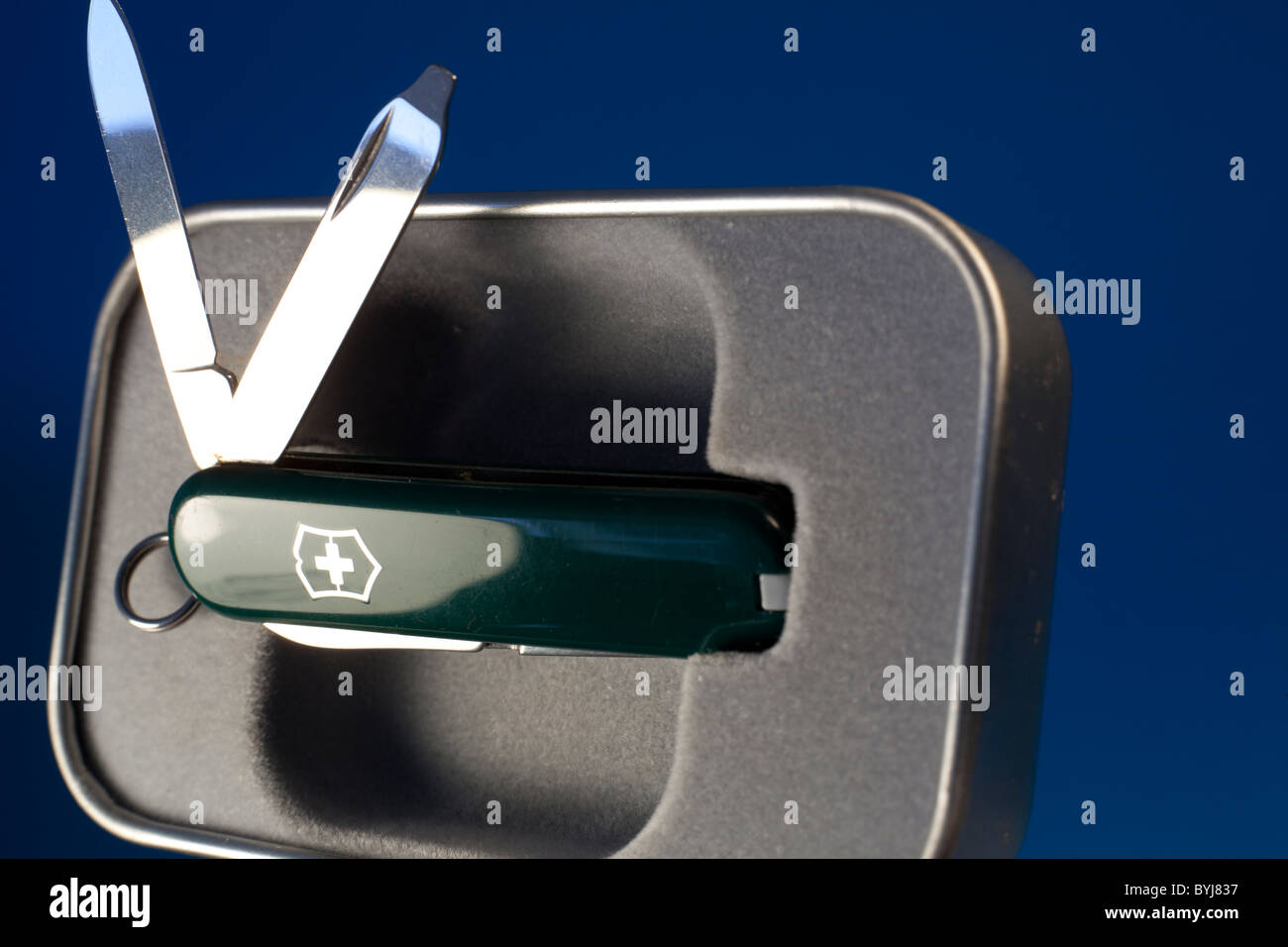 A executive swiss army knife in green Stock Photo Alamy