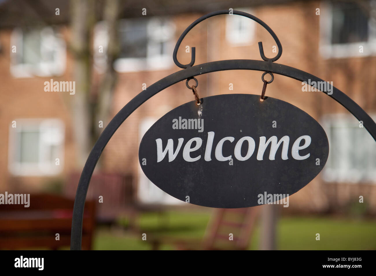 A welcome sign outside the entrance to a building, England UK Stock ...