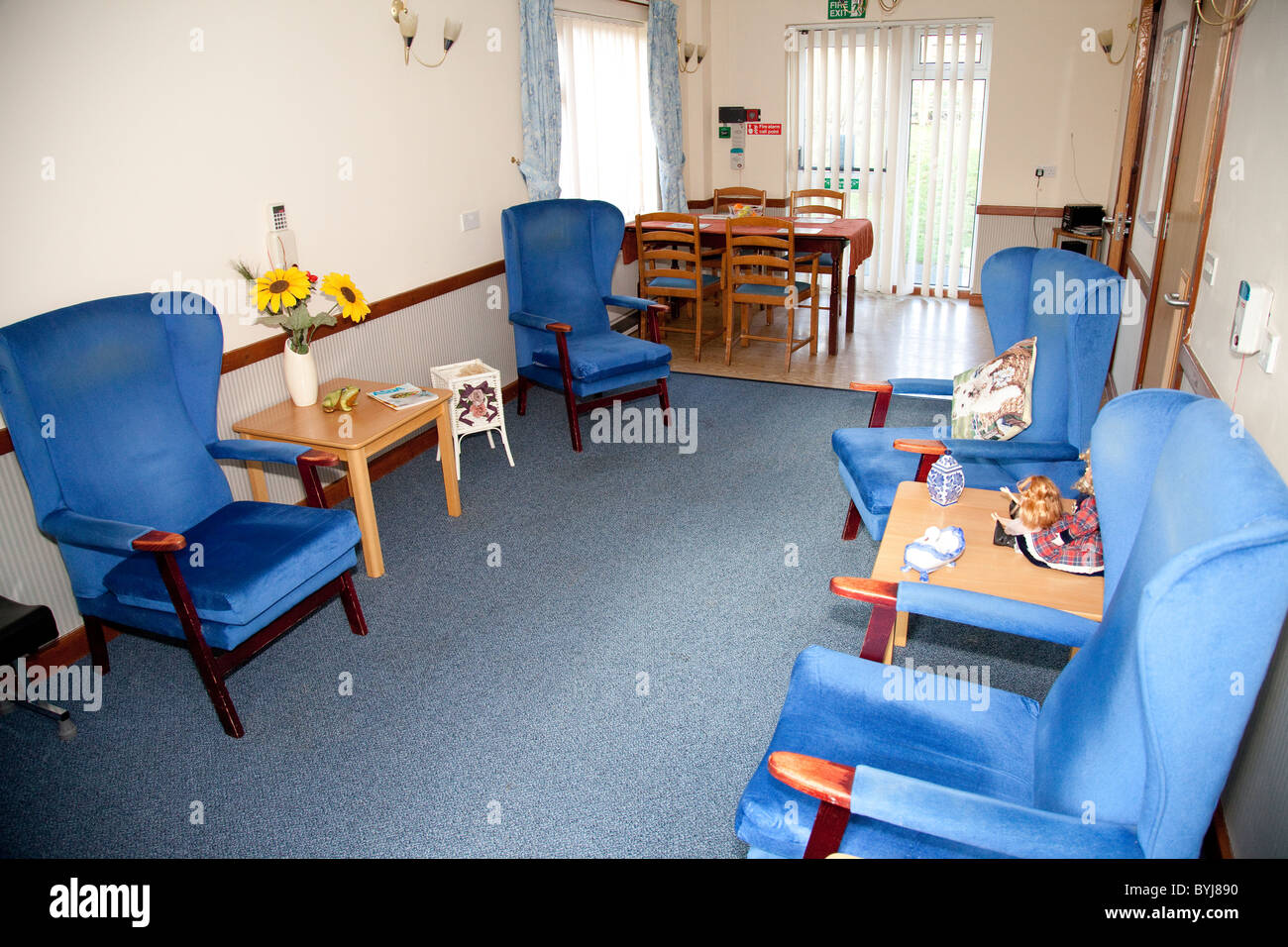 An empty lounge in an elderly nursing care home England UK Stock Photo