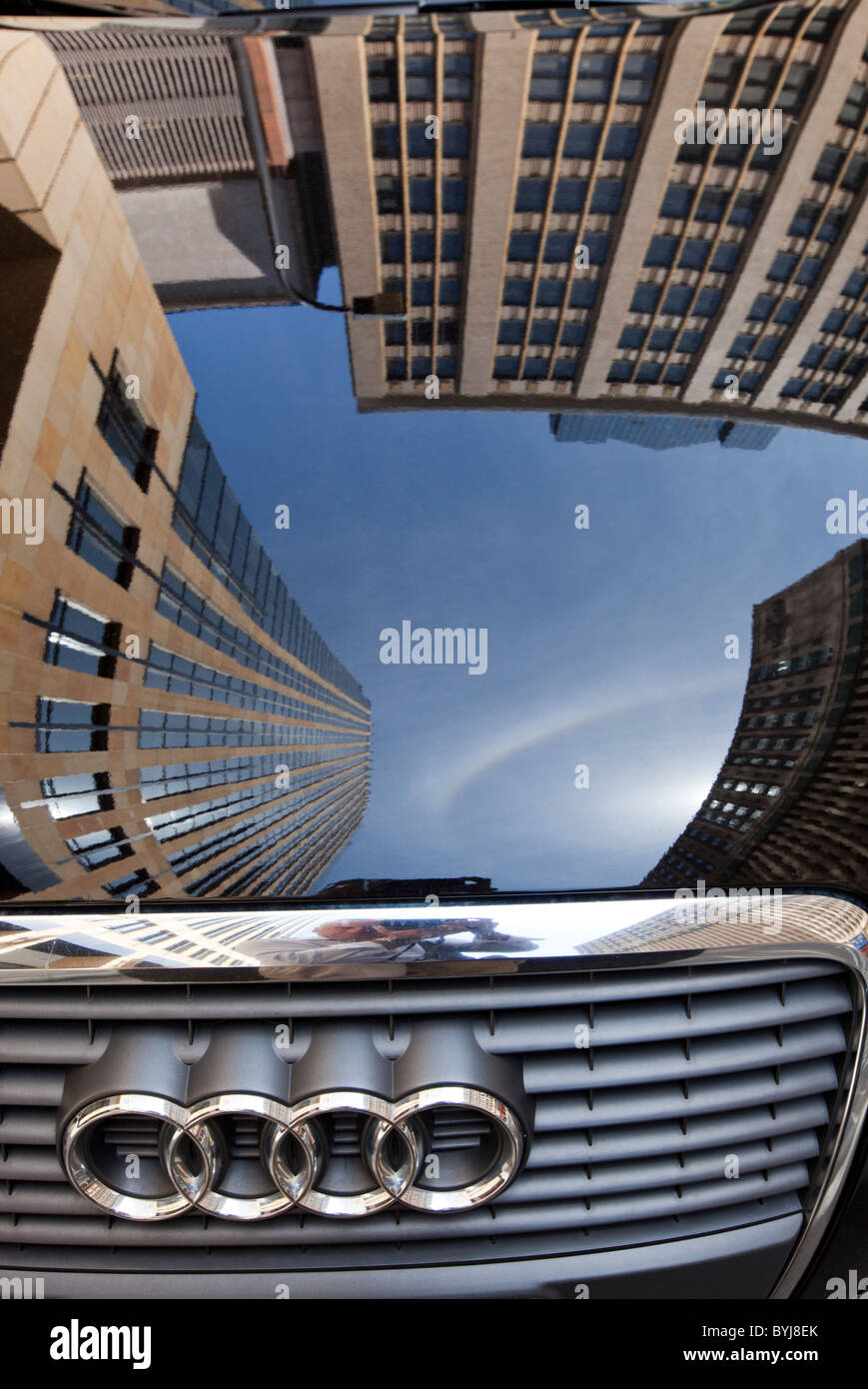 USA, Minnesota, Minneapolis, Reflection of office building in Audi car's hood Stock Photo