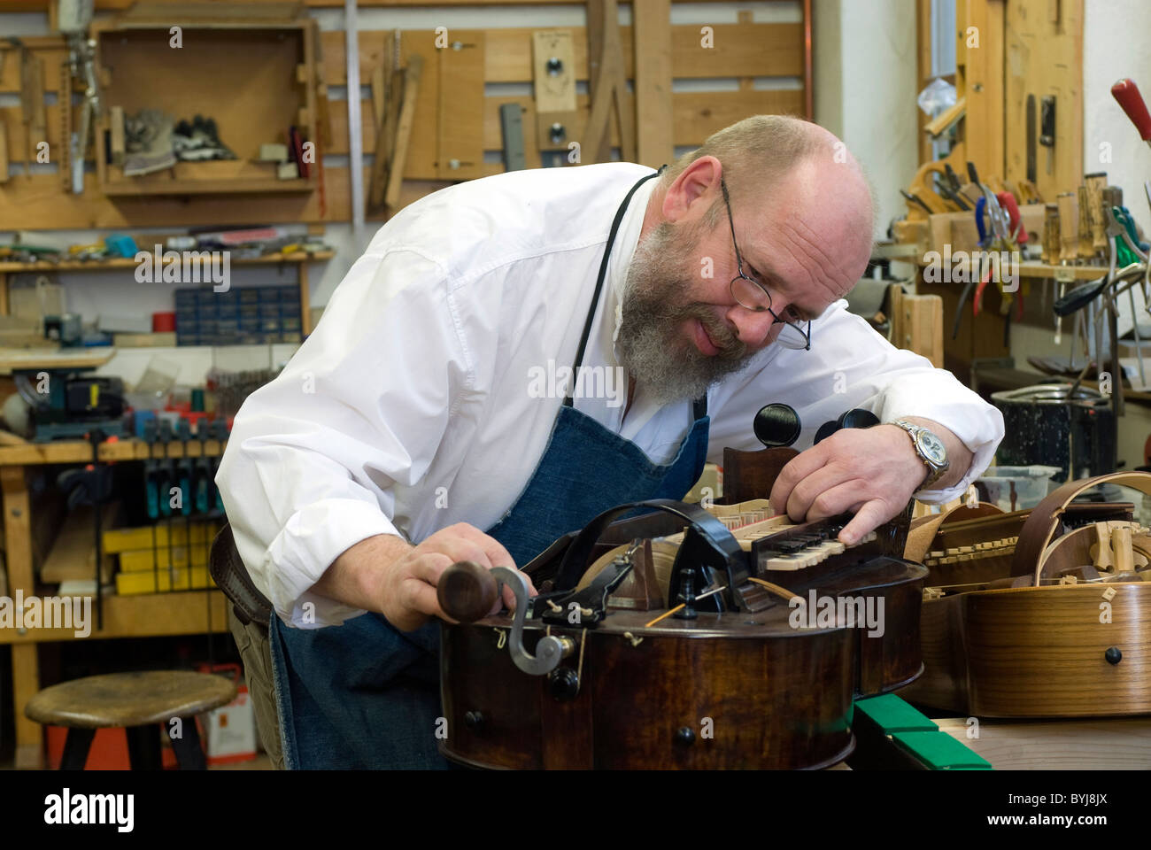 Stringed instrument maker hires stock photography and images Alamy