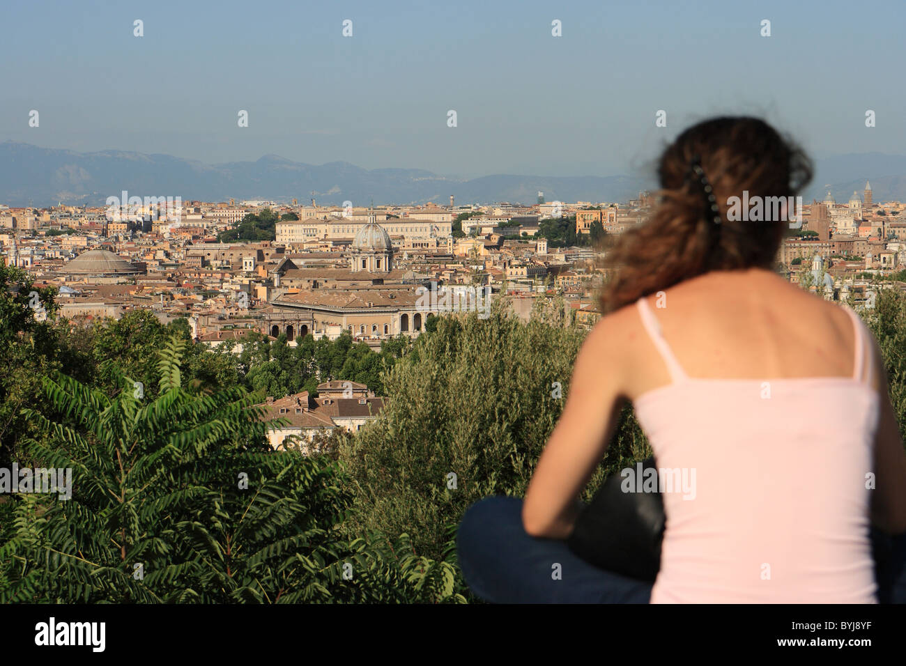 A woman enjoying the view from the Gianicolo Hill, Rome, Italy Stock Photo