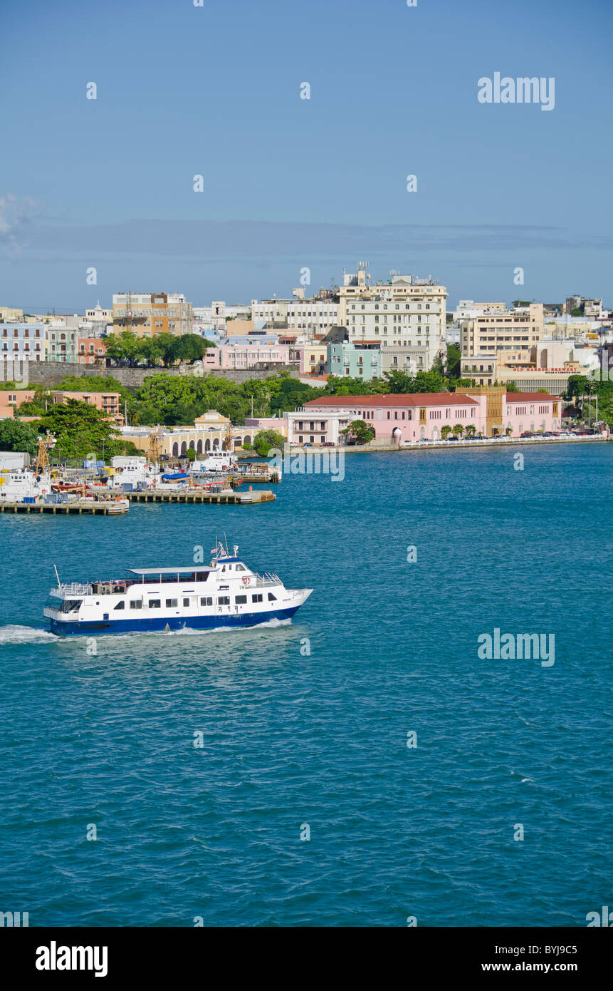 Puerto Rico Passenger ferry boat with Old San Juan as the background Stock Photo