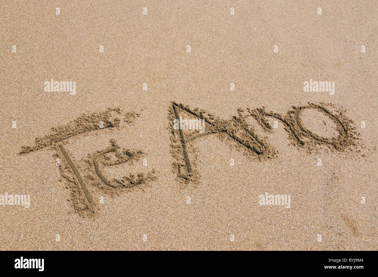 I love you written on the sand in Spanish on the Azuero Peninsula's Pacific coast in Panama. Stock Photo