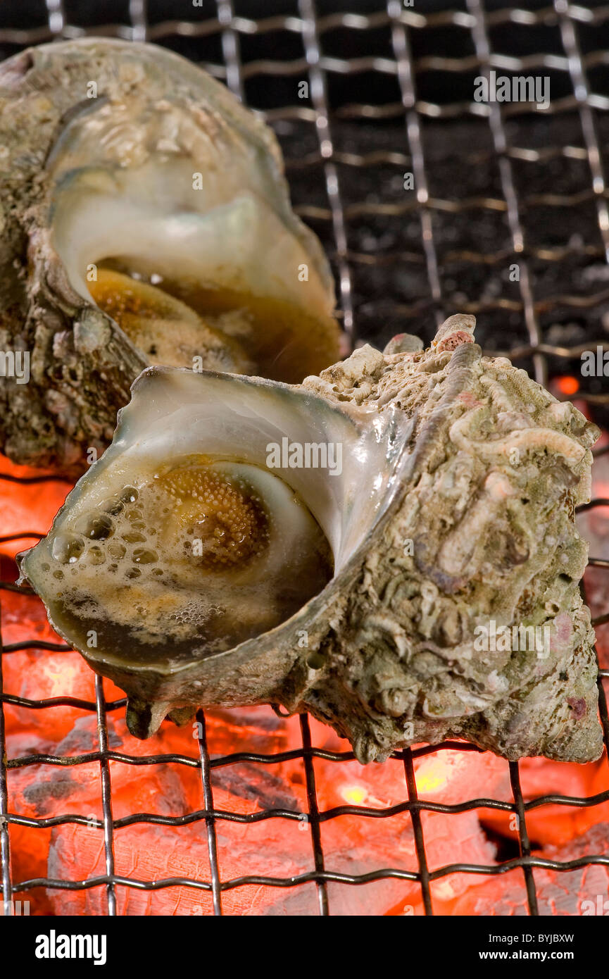 Shellfish Being Cooked on Barbecue Grill Stock Photo - Alamy