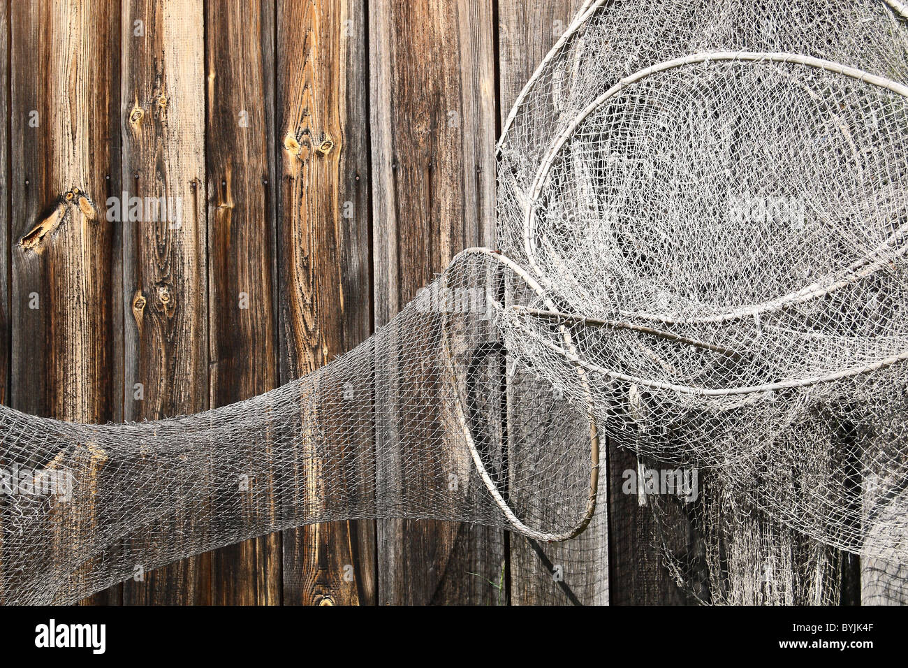 Fishing net wooden wall hi-res stock photography and images - Alamy