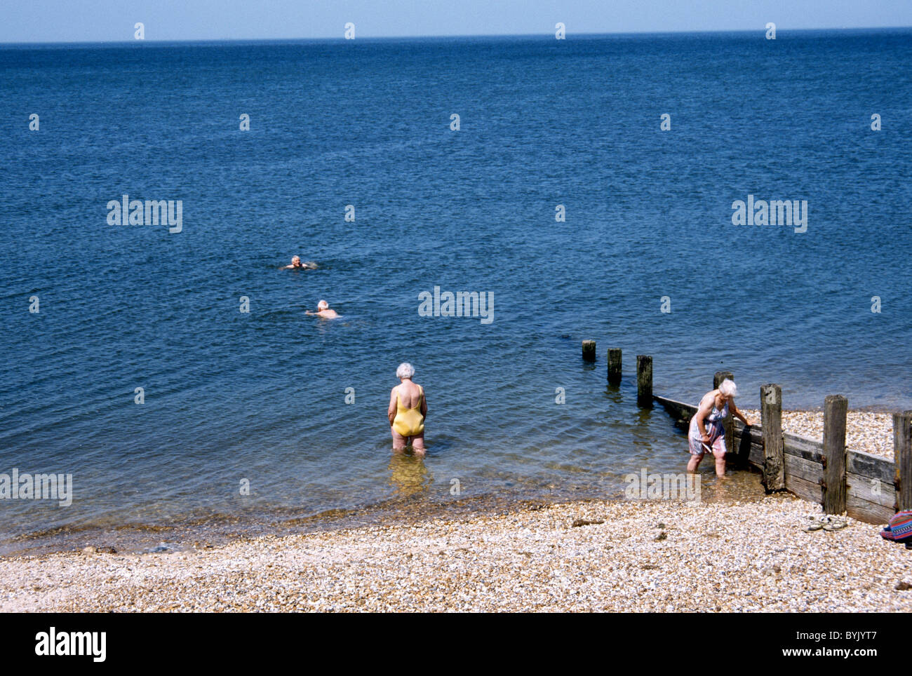 elderly woman rock climbing Stock Photo Alamy