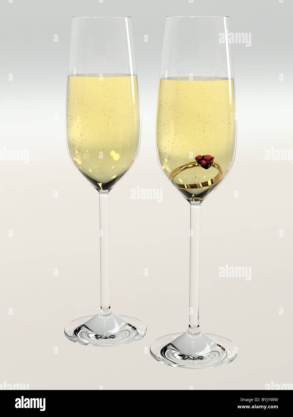 Golden diamond ring in champagne glasses Stock Photo Alamy