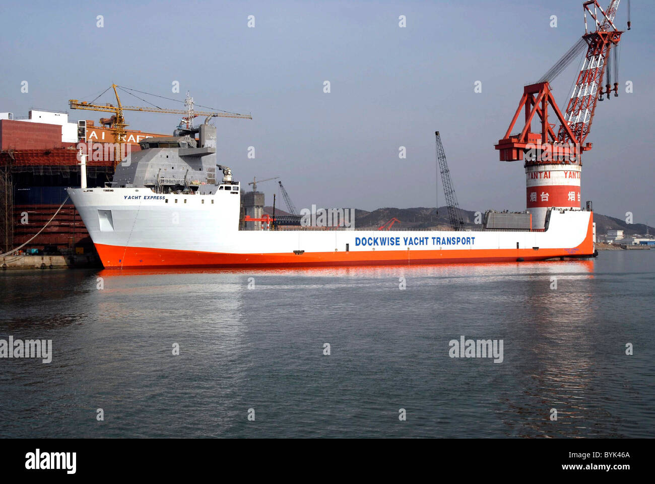 The Dockwise Yacht Transporter Need your fleet of luxury yachts delivered to your seventh home in the Caribbean? Can't be Stock Photo