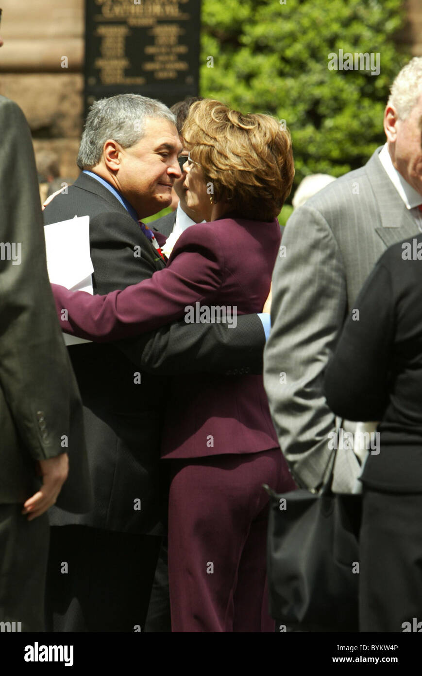 Speaker of the House Nancy Pelosi hugs a guest The funeral of the former president of the Motion Picture Association Jack Stock Photo