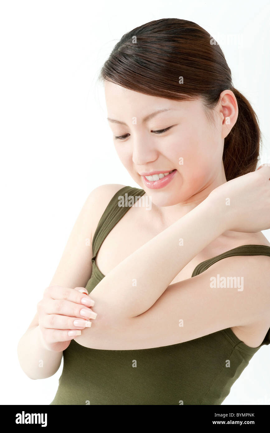 Young Woman Touching Her Elbow Stock Photo Alamy