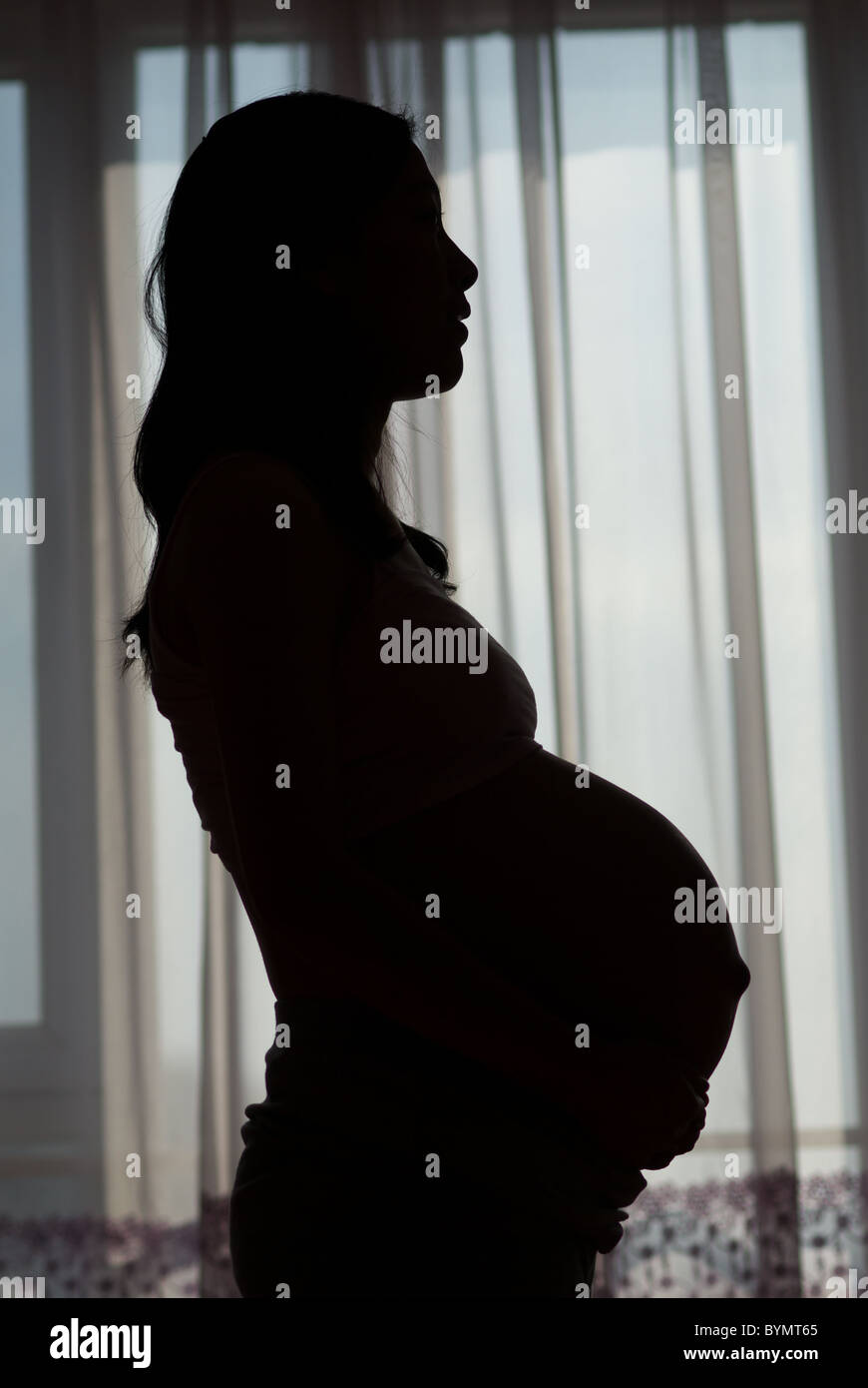 Pregnant chinese woman hi-res stock photography and images - Alamy