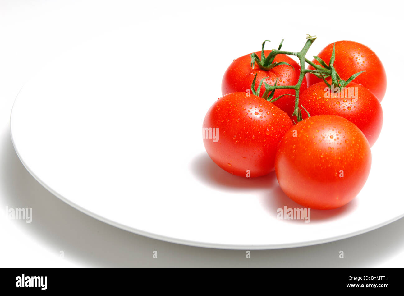 Five tomatoes hi-res stock photography and images - Alamy