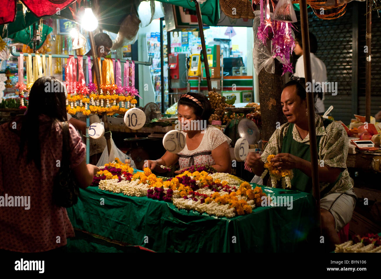 Night Flower Market at Memorial Bridge, Bangkok, Thailand Stock Photo
