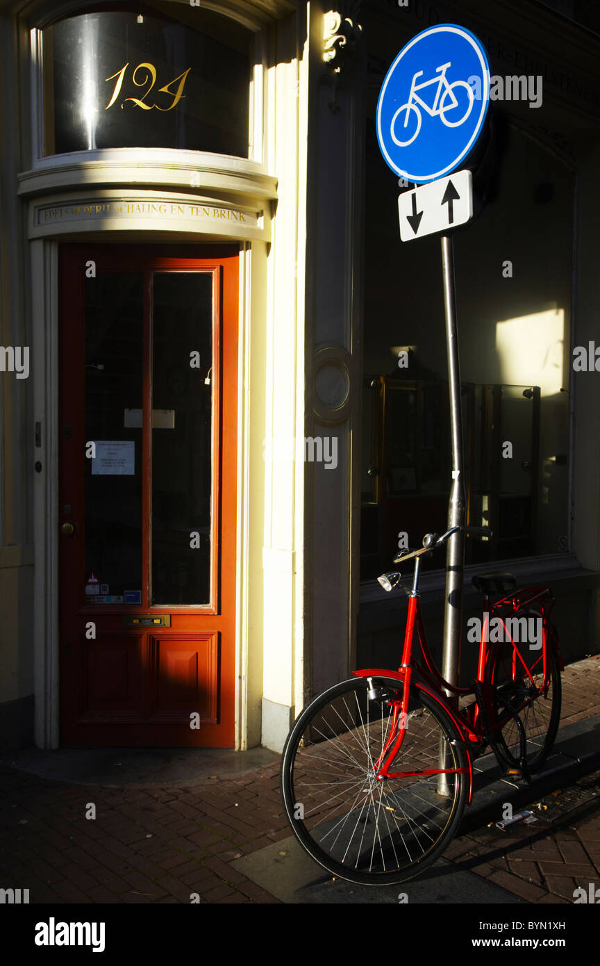 Netherlands, North Holland, Amsterdam. Bicycle left outside a