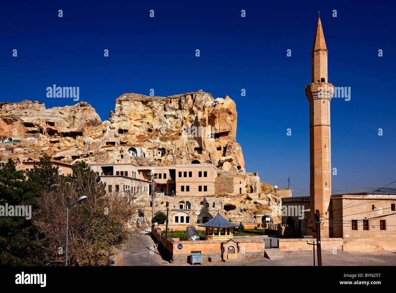 Photo from Urgup town, where you can see part of the old troglodyte settlement. Nevsehir, Cappadocia, Turkey. Stock Photo