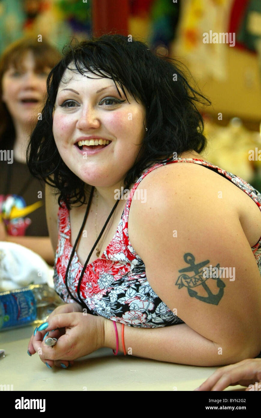 Beth Ditto of The Gossip signs merchandise backstage The first annual ...