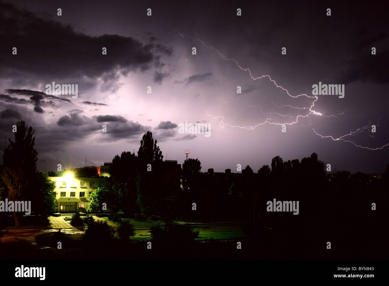 Lightning during night thunderstorm. on city Stock Photo