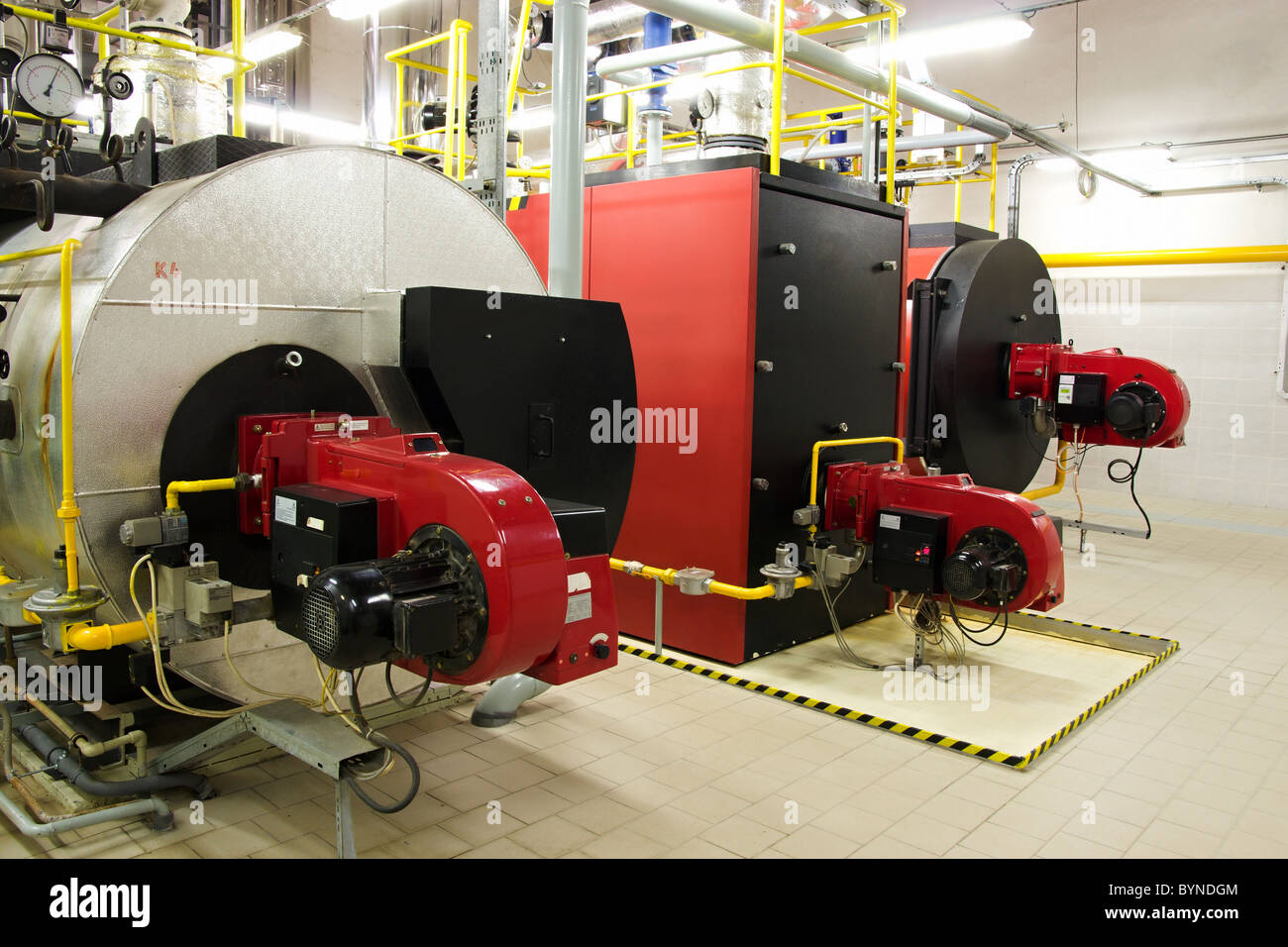 Gas boilers in gas boiler room for steam production Stock Photo