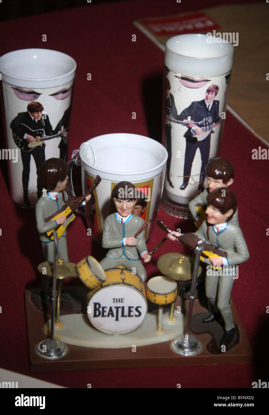 Beatles merchandising stage set and plastic beakers The Rock 'N' Roll  Celebrity Memorabilia Fame Bureau Auction held at the Stock Photo - Alamy
